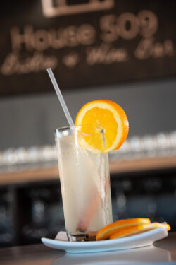 Mocktail with ice at bar with Cinnamon and orange slices