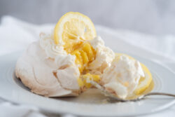 Lemon curd mini Pavlova on a white background. Studio series for SoftLightPhotography